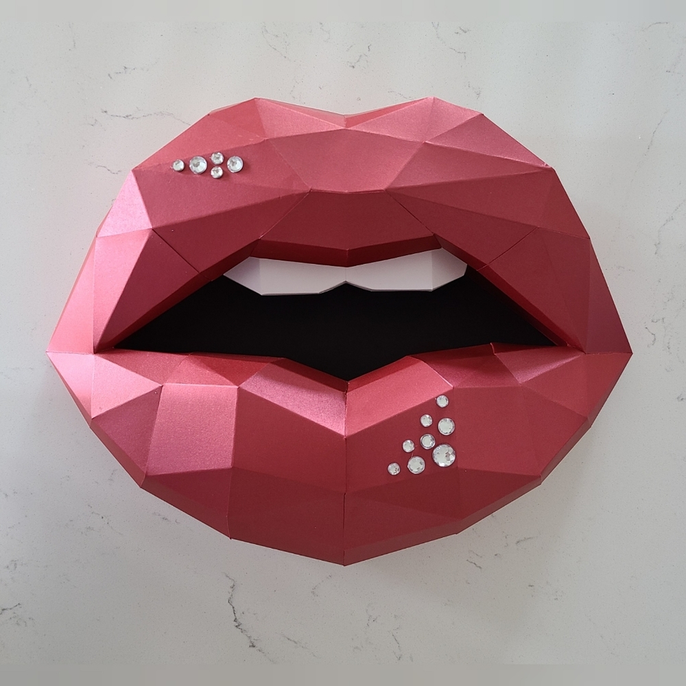Paper lips make up 3D wall decor